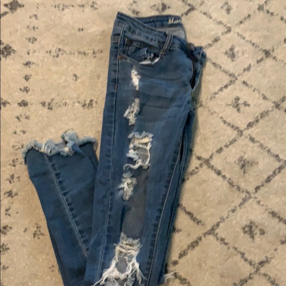 Distressed raw hem jeans